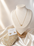 Conjunto de lazo dorado