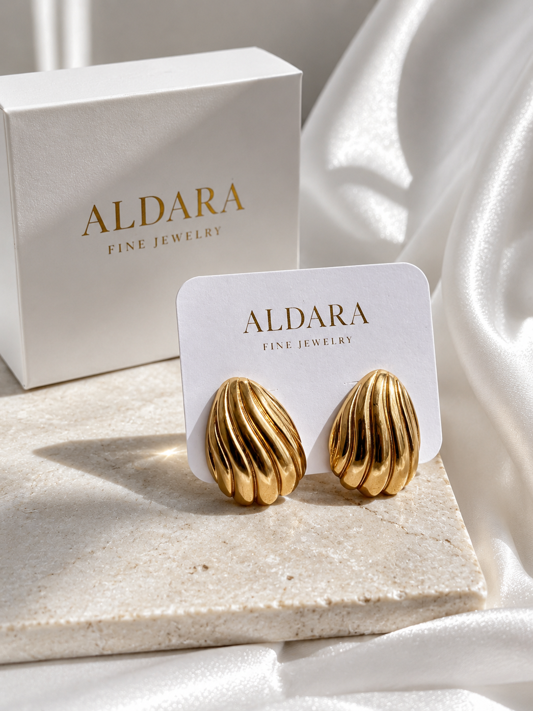 Aretes Concha Dorada